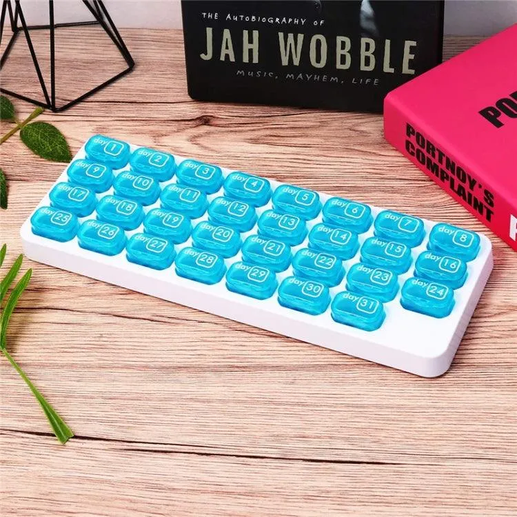 31-Compartment Portable Pill Organizer with Keyboard Design